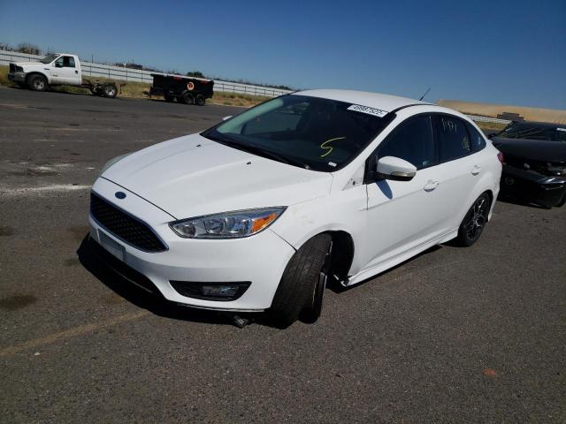 Photo 2 from auction – 2016 FORD FOCUS SE with VIN 1FADP3F2XGL247080