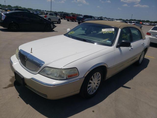 Photo 2 from auction – 2004 LINCOLN TOWN CAR E with VIN 1LNHM81WX4Y611441