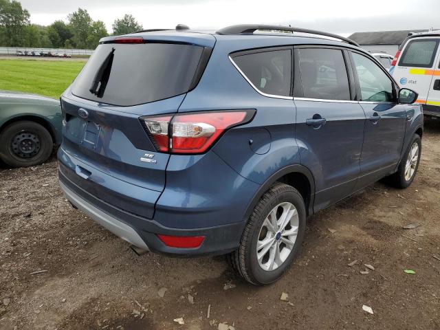 Photo 4 from auction – 2018 FORD ESCAPE SE with VIN 1FMCU9GDXJUA81612