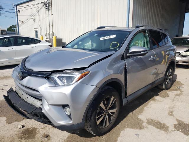 Photo 2 from auction – 2017 TOYOTA RAV4 XLE with VIN 2T3WFREV7HW381645