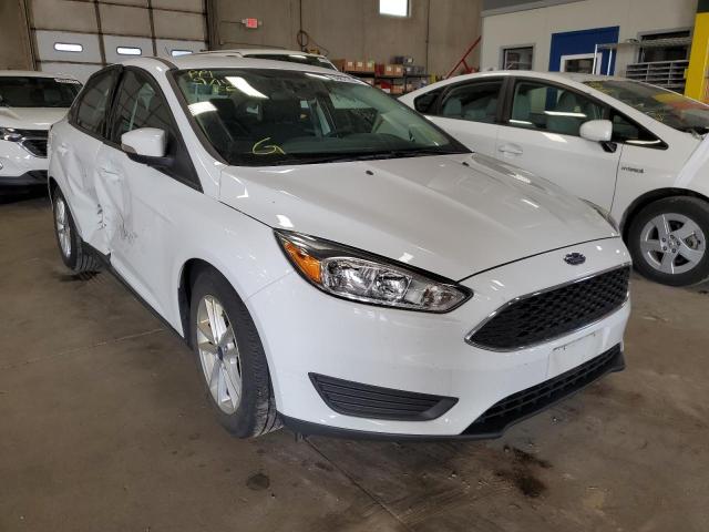 FORD FOCUS SE 2016 with VIN 1FADP3F2XGL387694 - Photo from auction