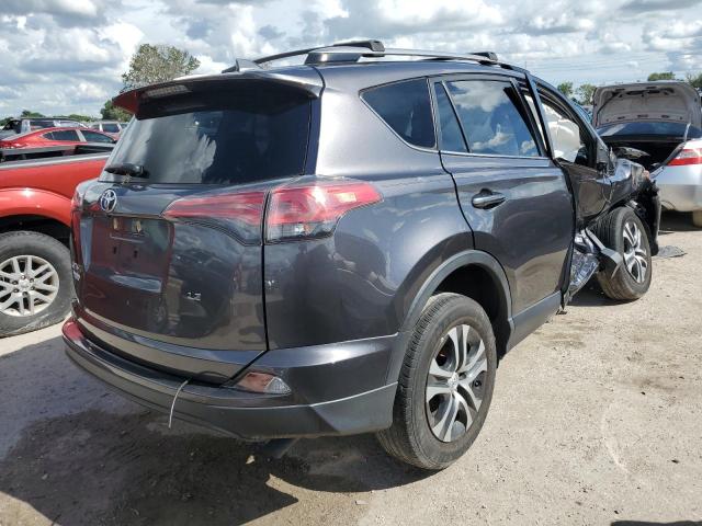 Photo 4 from auction – 2018 TOYOTA RAV4 LE with VIN JTMZFREV4JJ175572