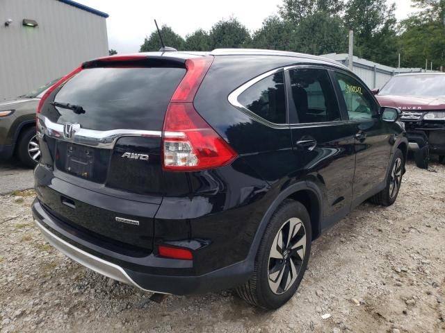 Photo 4 from auction – 2015 HONDA CR-V TOURI with VIN 5J6RM4H94FL100352