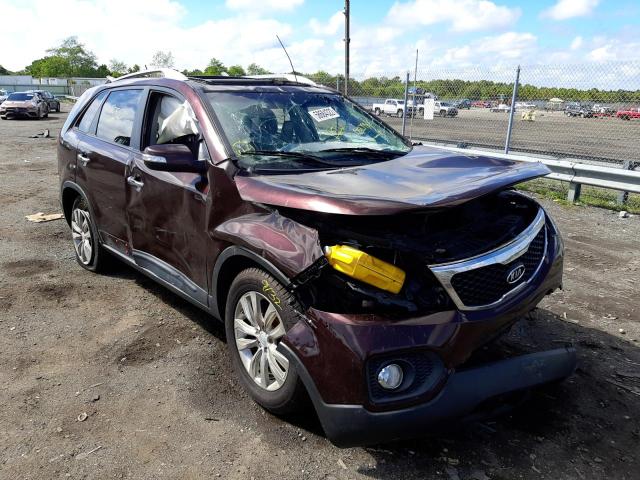 KIA SORENTO EX 2011 with VIN 5XYKUDA28BG052798 - Photo from auction
