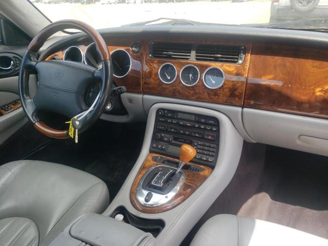 Photo 10 from auction – 2004 JAGUAR XK8 with VIN SAJDA42C442A39475