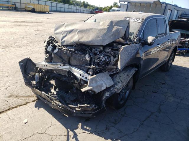 Photo 2 from auction – 2021 HONDA RIDGELINE with VIN 5FPYK3F72MB014676