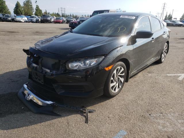 Photo 2 from auction – 2018 HONDA CIVIC EX with VIN 2HGFC2F70JH607841