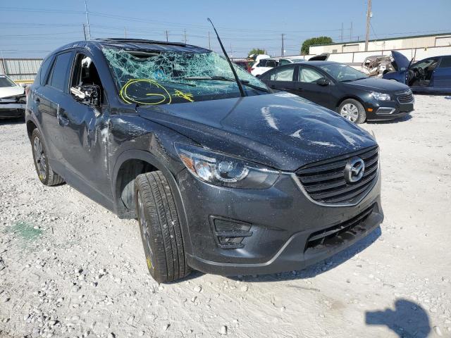 MAZDA CX-5 GT 2016 with VIN JM3KE2DY9G0886679 - Photo from auction