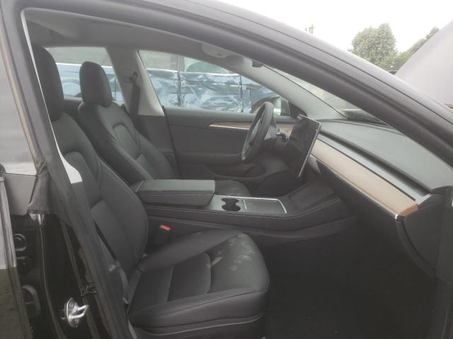 Photo 5 from auction – 2021 TESLA MODEL 3 with VIN 5YJ3E1EA9MF017683