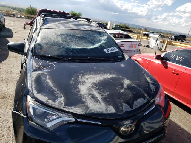 Photo 9 from auction – 2018 TOYOTA RAV4 LE with VIN JTMBFREV2JJ235639