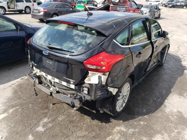 Photo 4 from auction – 2015 FORD FOCUS TITA with VIN 1FADP3N23FL222084