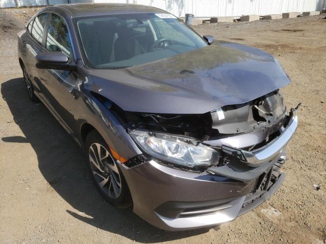 HONDA CIVIC EX 2018 with VIN 2HGFC2F77JH580847 - Photo from auction