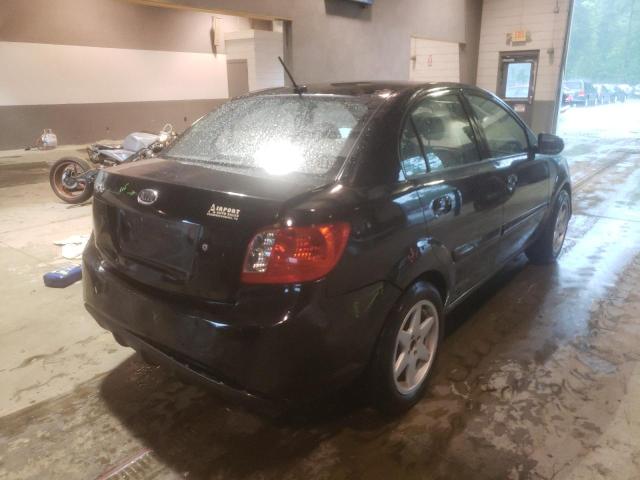 Photo 4 from auction – 2011 KIA RIO BASE with VIN KNADH4A32B6913110