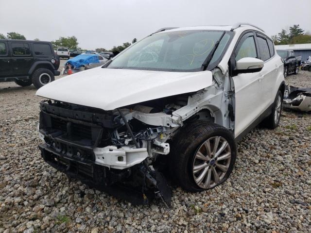 Photo 2 from auction – 2017 FORD ESCAPE TIT with VIN 1FMCU9J96HUD80545