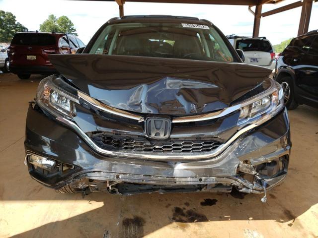 Photo 7 from auction – 2015 HONDA CR-V EXL with VIN 2HKRM3H73FH545149