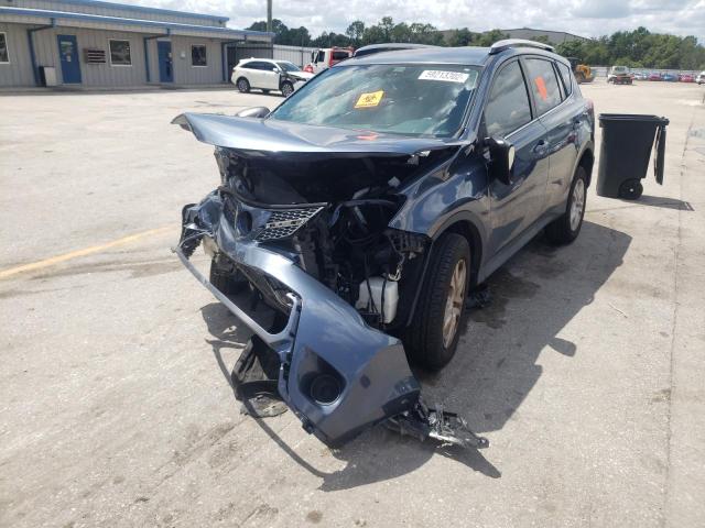 Photo 2 from auction – 2014 TOYOTA RAV4 LE with VIN JTMZFREV1ED040005