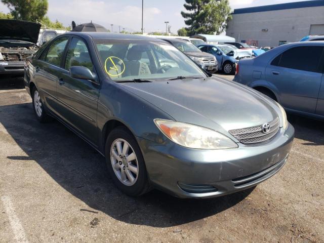 Photo 1 from auction – 2002 TOYOTA CAMRY LE with VIN JTDBE32K520106442