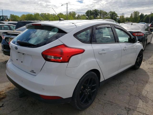 Photo 4 from auction – 2016 FORD FOCUS SE with VIN 1FADP3K28GL326009