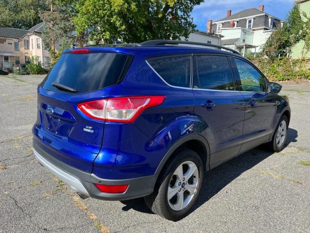 Photo 4 from auction – 2016 FORD ESCAPE SE with VIN 1FMCU9GX1GU 82544