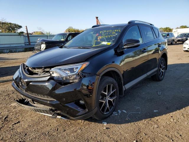 Photo 2 from auction – 2018 TOYOTA RAV4 SE with VIN 2T3JFREV4JW757640