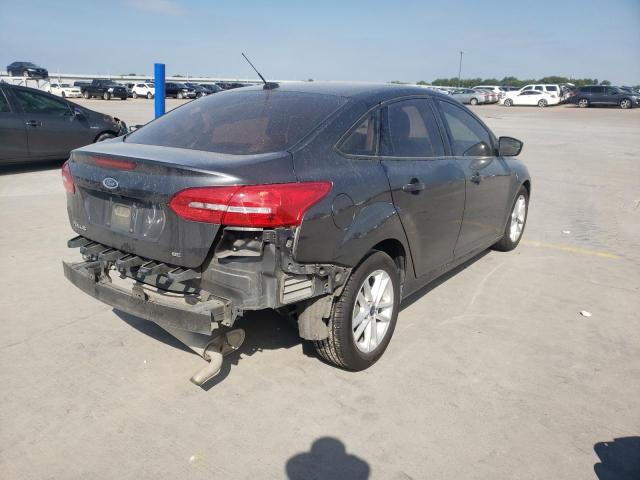 Photo 4 from auction – 2017 FORD FOCUS SE with VIN 1FADP3F21HL214034
