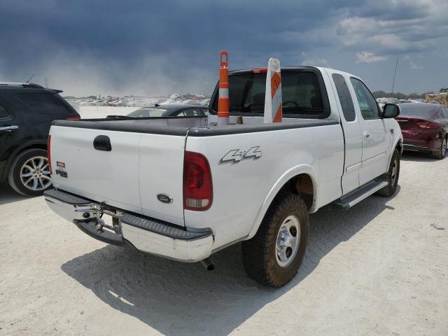 Photo 4 from auction – 2003 FORD F150 with VIN 1FTRX18W63NA71650