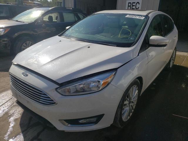 Photo 2 from auction – 2015 FORD FOCUS TITA with VIN 1FADP3N22FL291395
