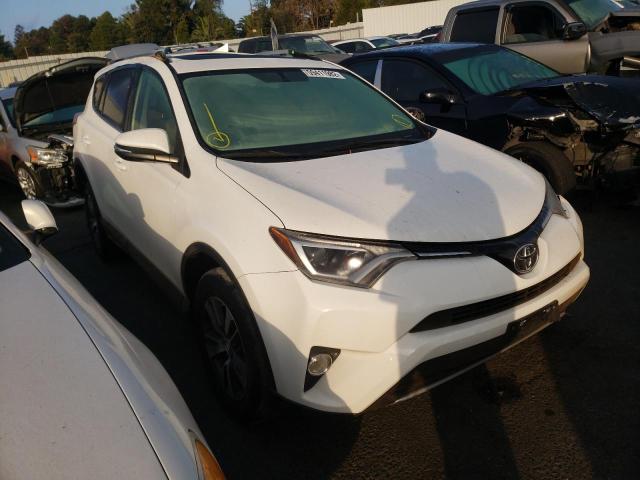 TOYOTA RAV4 XLE 2016 with VIN 2T3WFREV0GW265671 - Photo from auction