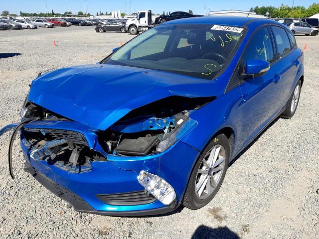 Photo 2 from auction – 2015 FORD FOCUS SE with VIN 1FADP3K25FL369947