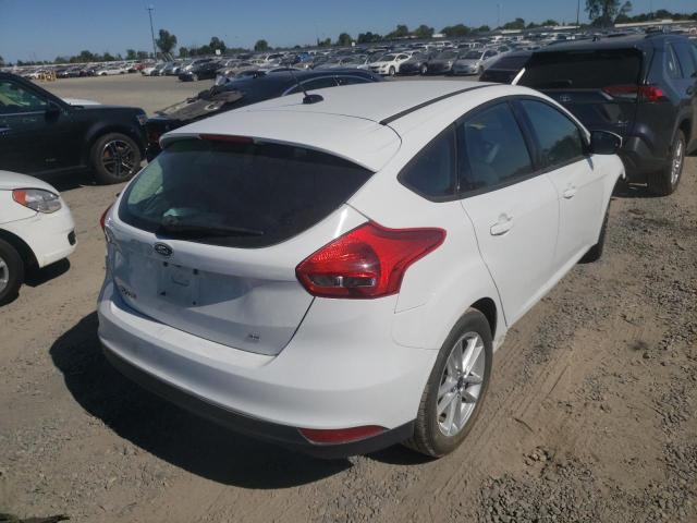 Photo 4 from auction – 2016 FORD FOCUS SE with VIN 1FADP3K24GL264270