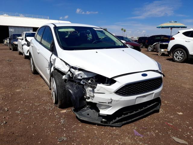 FORD FOCUS SE 2018 with VIN 1FADP3K26JL260728 - Photo from auction
