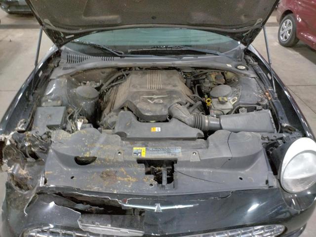 Photo 7 from auction – 2004 FORD THUNDERBIR with VIN 1FAHP60A04Y110876