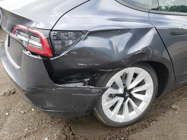 Photo 9 from auction – 2022 TESLA MODEL 3 with VIN 5YJ3E1EAXNF190176