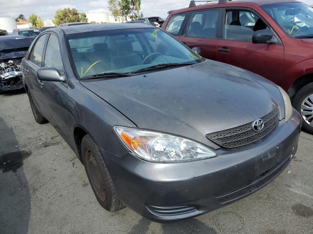 TOYOTA CAMRY LE 2004 with VIN 4T1BE32K74U818779 - Photo from auction