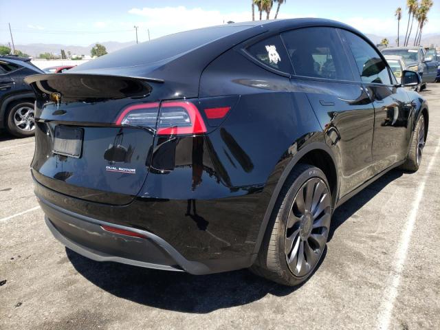 Photo 4 from auction – 2021 TESLA MODEL Y with VIN 5YJYGDEF6MF070192