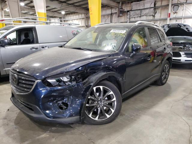 Photo 2 from auction – 2016 MAZDA CX-5 GT with VIN JM3KE4DY1G0874750