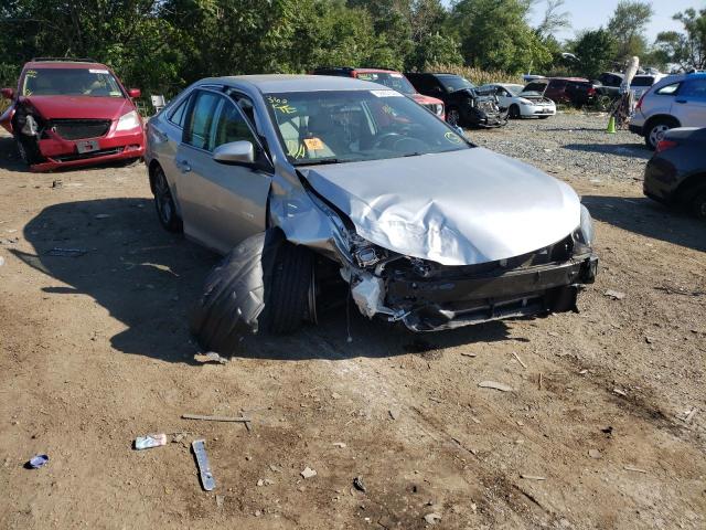 TOYOTA CAMRY LE 2016 with VIN 4T1BF1FK1GU127733 - Photo from auction