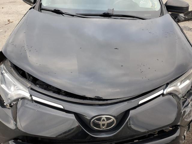 Photo 7 from auction – 2018 TOYOTA RAV4 LE with VIN 2T3BFREV2JW807732