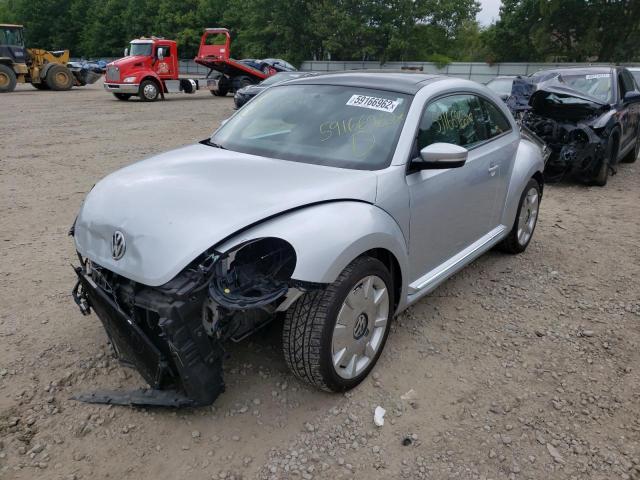 Photo 2 from auction – 2013 VOLKSWAGEN BEETLE with VIN 3VWJP7AT9DM674990