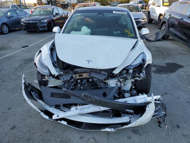 Photo 9 from auction – 2022 TESLA MODEL 3 with VIN 5YJ3E1EA5NF143007
