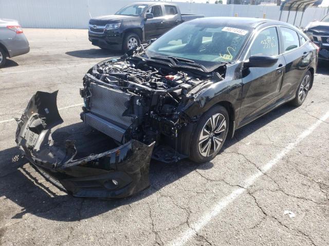 Photo 2 from auction – 2018 HONDA CIVIC EX with VIN 2HGFC1F31JH640239