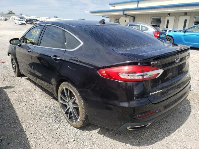 Photo 3 from auction – 2019 FORD FUSION TIT with VIN 3FA6P0D91KR180659