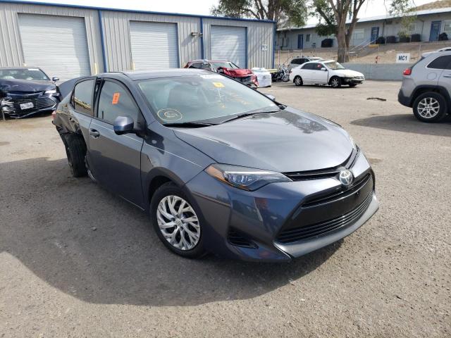 TOYOTA COROLLA L 2018 with VIN 5YFBURHE5JP787097 - Photo from auction