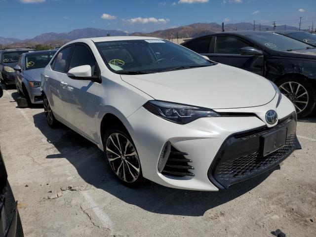 TOYOTA COROLLA L 2018 with VIN 5YFBURHE0JP819387 - Photo from auction