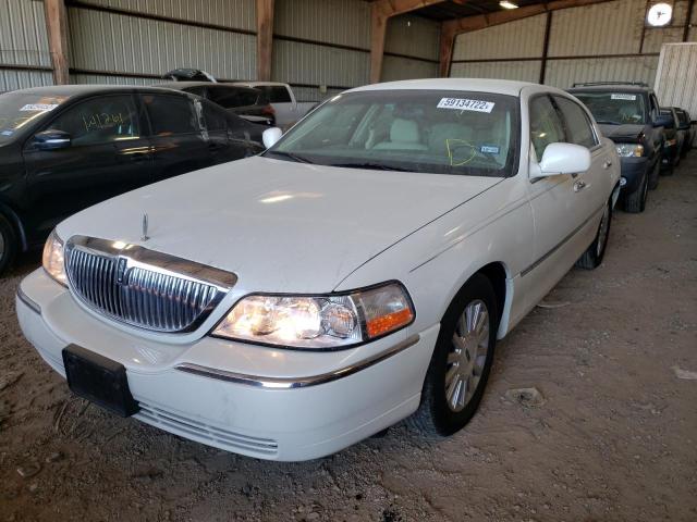 Photo 2 from auction – 2003 LINCOLN TOWN CAR E with VIN 1LNHM81WX3Y655518