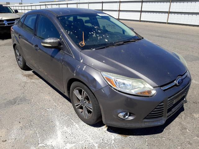 FORD FOCUS SE 2014 with VIN 1FADP3F29EL118678 - Photo from auction