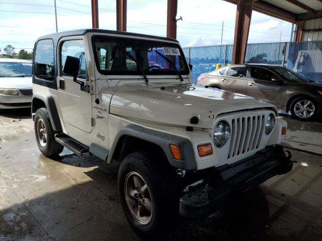 JEEP WRANGLER / 1998 with VIN 1J4FY19S9WP785450 - Photo from auction
