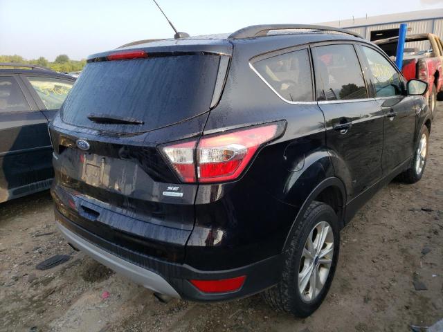 Photo 4 from auction – 2017 FORD ESCAPE SE with VIN 1FMCU0GD2HUC64637