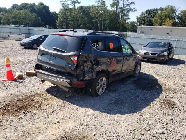 Photo 4 from auction – 2017 FORD ESCAPE SE with VIN 1FMCU0GD7HUC59286