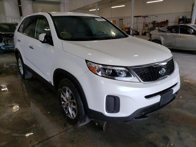 KIA SORENTO LX 2015 with VIN 5XYKTCA67FG649656 - Photo from auction